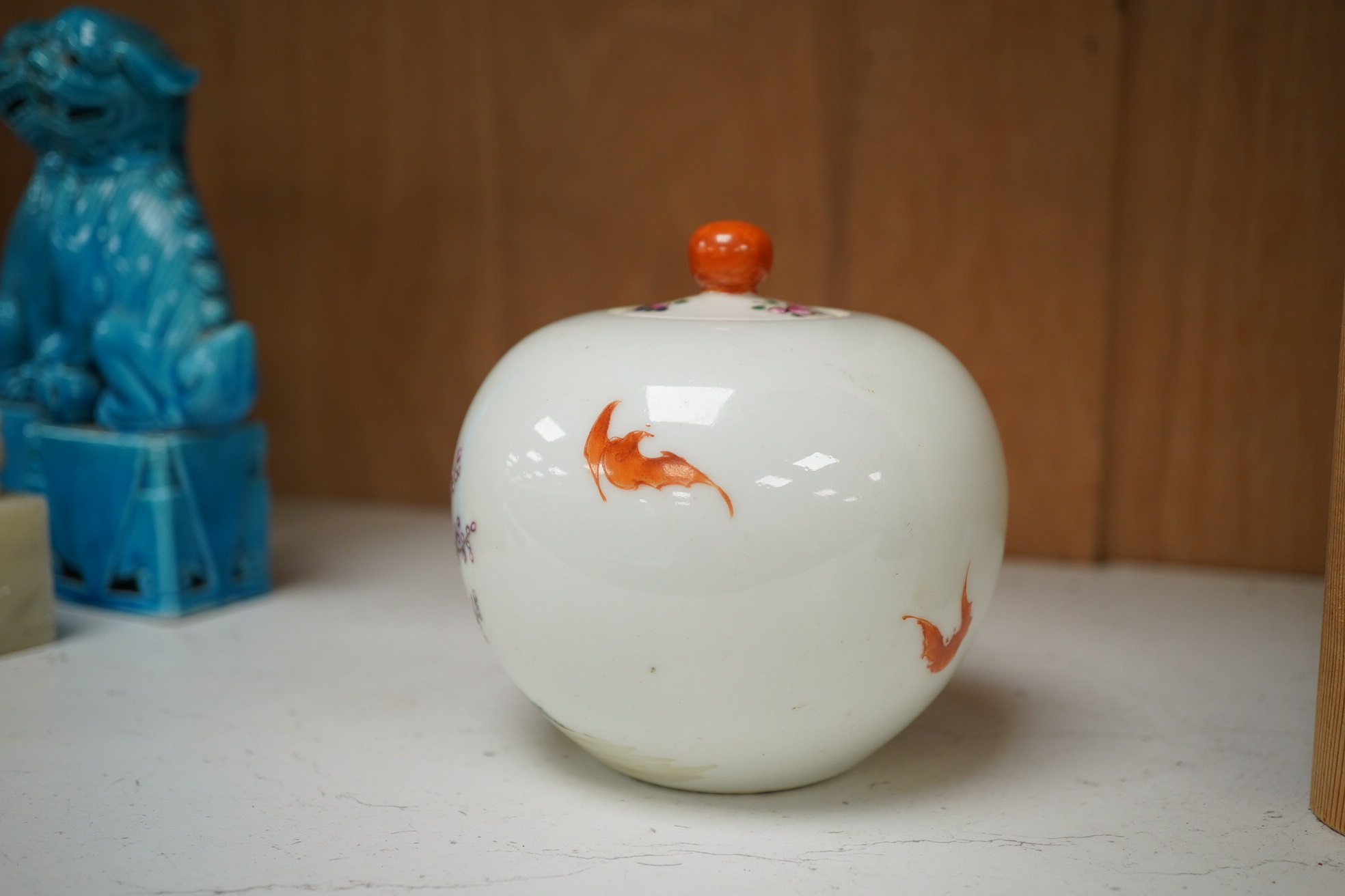 A famille rose bullet shape jar and cover, 10cm high. Condition - fair to good